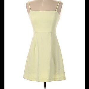 Adorable yellow mini dress from South Moon Under. Size 6 brand new